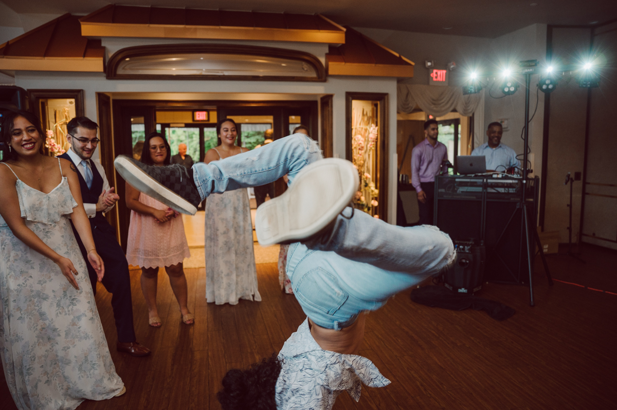 These two dancers, passionate lovers got married on a hot humid day at Auletto Caterers in Deptford NJ. Even though it was hot & humid Nina and Hector were all smiles as well as their family during the family portrait time. Wedding couple's and families that listens to you and does everything you ask them to even though the weather and environment can be tough are the BEST kind of clients! Nina and Hector were that best ideal clients, they from day one left all control regarding photo to me, did not question or have concerns. Knowing that you have this full trust and control on the wedding day makes you want to give your 100% and more. Nina and Hector are one of my top ideal clients and their wedding day photos are living proof of it. Nina and Hector's wedding day was combined of casual, mess, chaos, laughters, chill, emotional and passionate love for dancing. This was my first time at Auletto Caterers and in this part of NJ and this wedding venue in Deptford NJ was a pleasant surprise. It was full of secret locations for photos, garden, little pond where I played around with reflections, peacocks, waterfall and lavender field! Plus kind people to work with. Nina and Hector's July wedding at Auletto Caterers NJ captured by Karis from Hey Karis NY, NJ, Brooklyn, Hudson Valley and Catskills Wedding and Elopement Photographer.